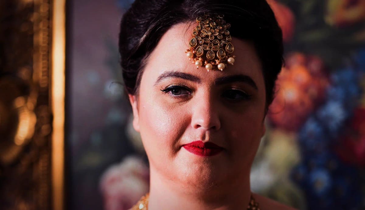 A Sri Sakhi bride at her final trial in ivory and antique gold