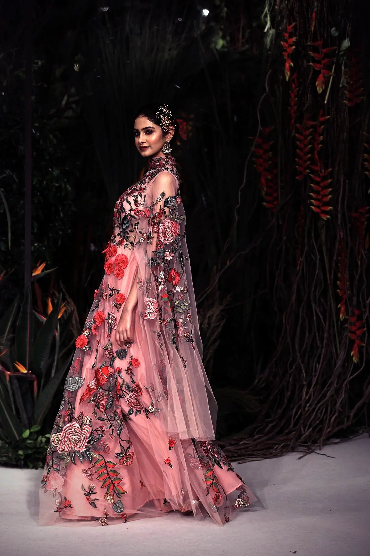 Signature plum drape in movement