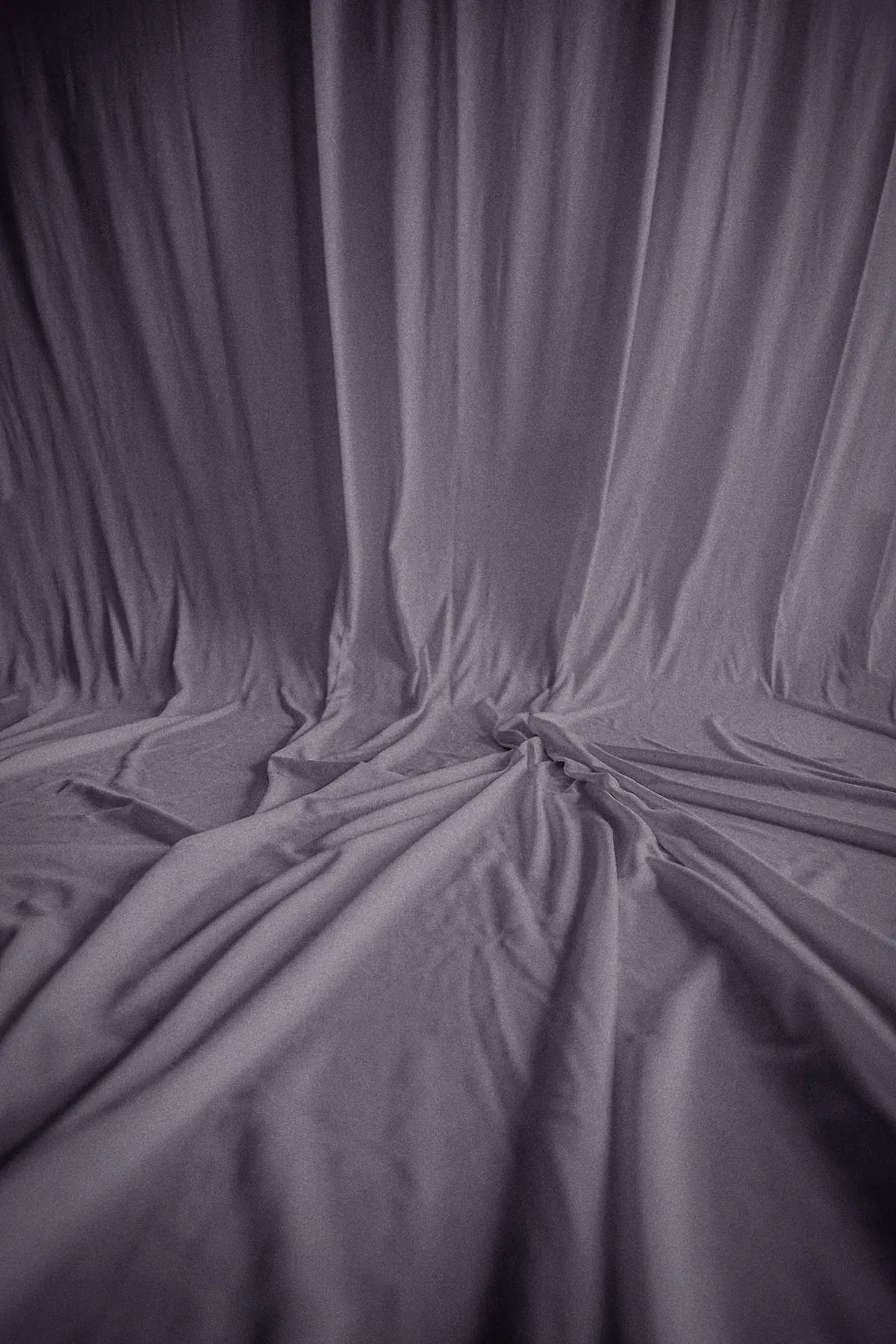 The palest trace of plum on ivory silk